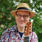 Professioneller Gitarrenunterricht – Helm van Hahm